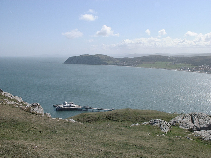 an image of Little Orme and pier