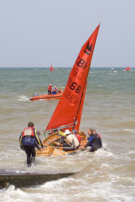 an image of Launching a sailing boat