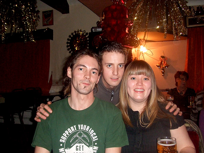 an image of Christmas Eve 2007, Eddie, Nick, and Liz