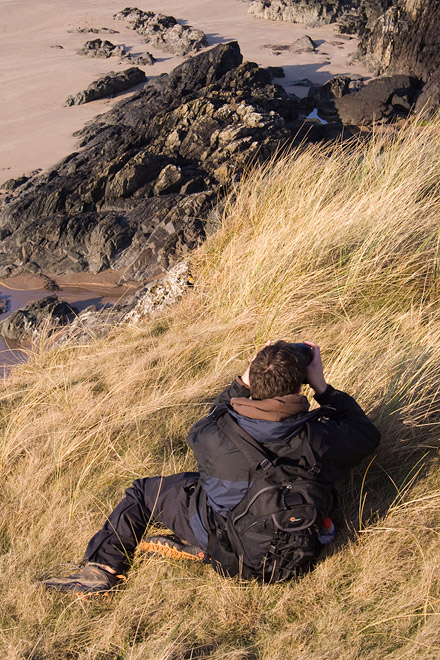 an image of Matt shooting near the cliff