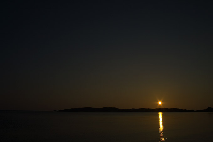 an image of Sunset over Newborough beach