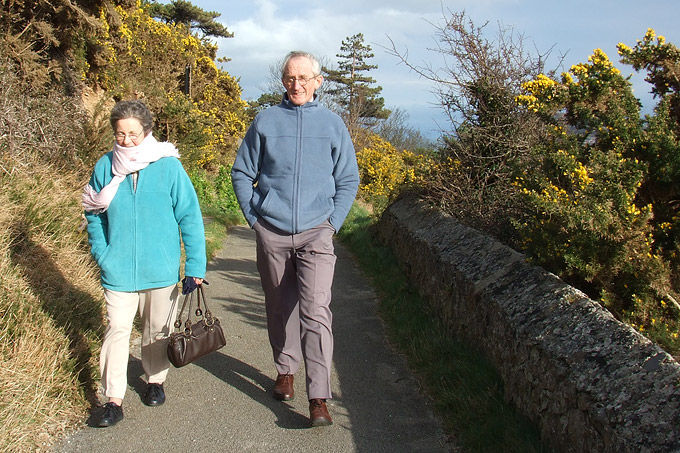 an image of Gran and Poppa walking along the orme